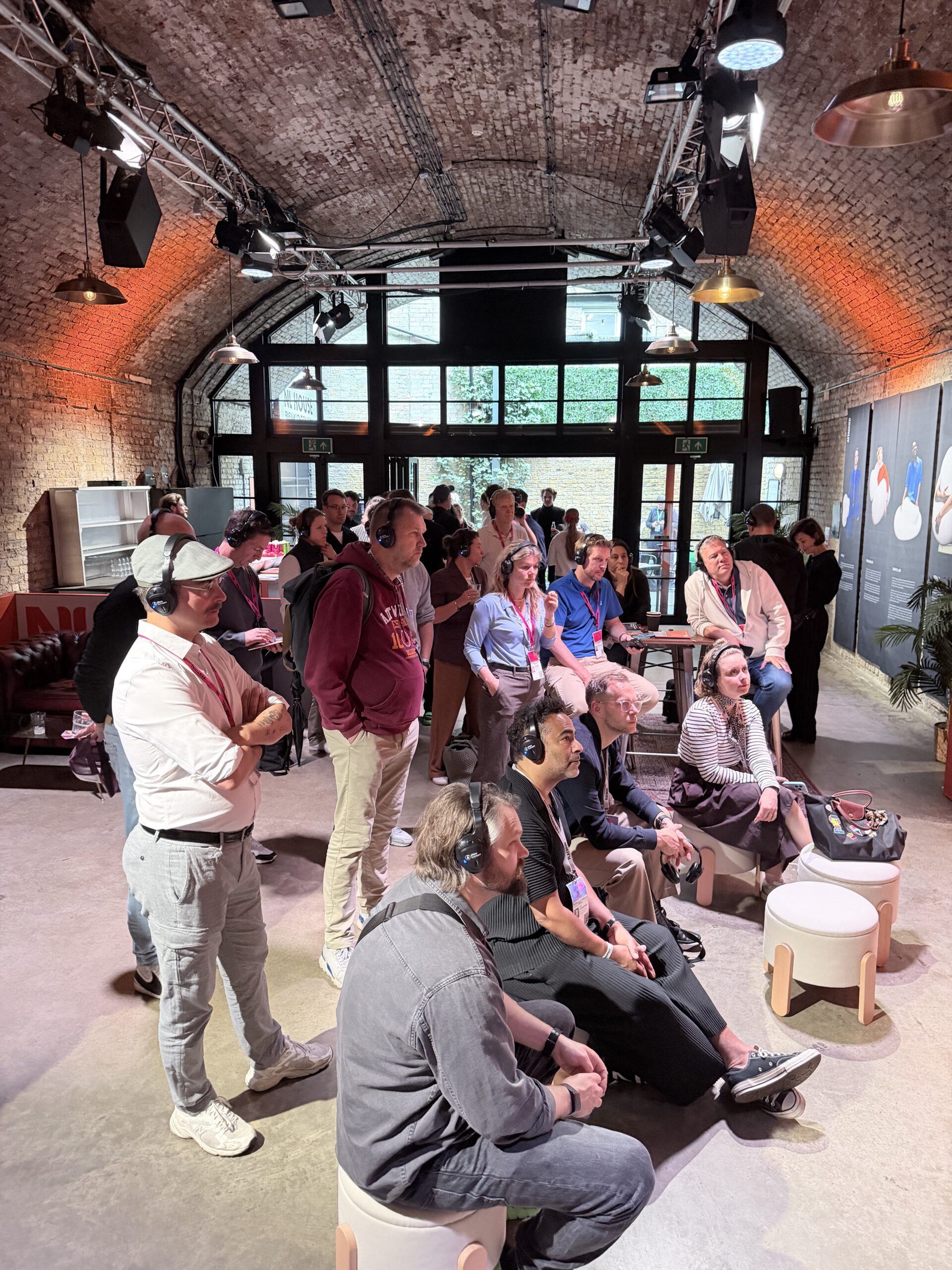 Delegates wearing conference headphones at Dutch Embassy expo, The Bike Shed London
