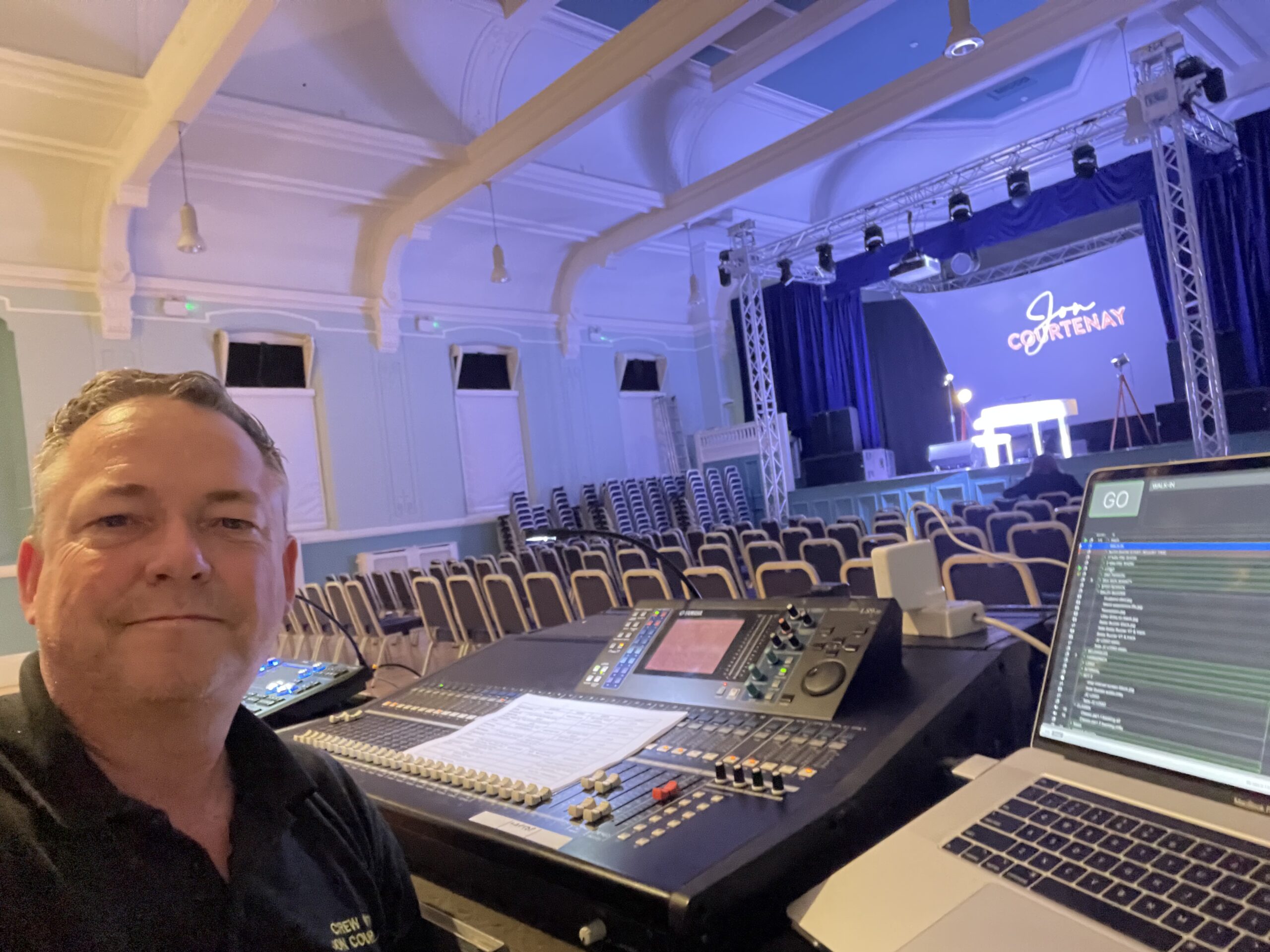 Andrew Lake at the sound desk on tour